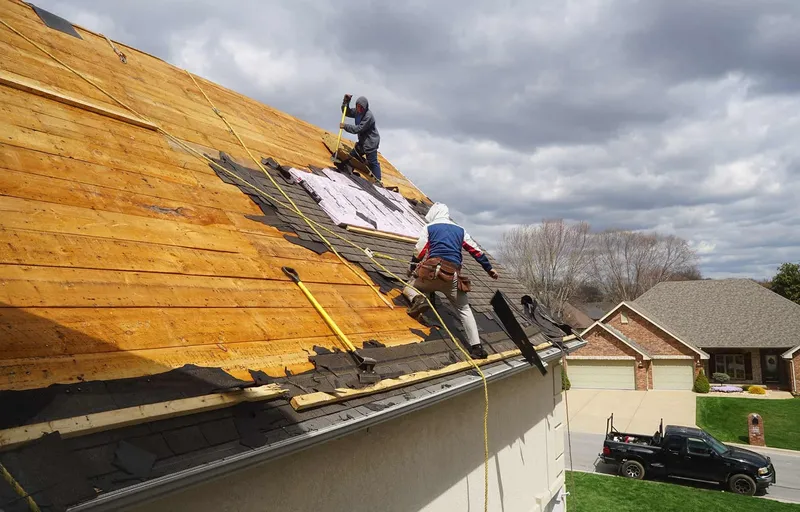 services-1 Roofing crew re-decking a home in Austin, Texas